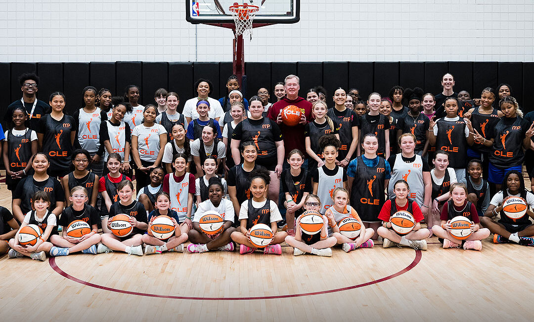 Cavaliers Legend Mark Price shown at Rocket Arena with 60 girls, aged 8-14, who participated in the 28th female-focused event since September 2025.
